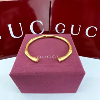 Gucci GG Interlocking Open Cuff Gold & Silver Bracelet