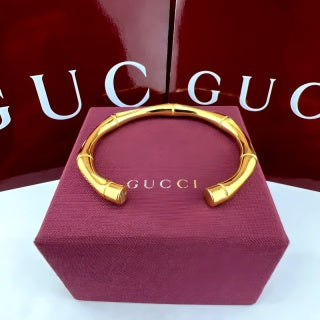 Gucci GG Interlocking Open Cuff Gold & Silver Bracelet
