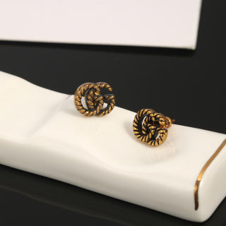 Gucci Twisted Spiral Logo Stud Earrings