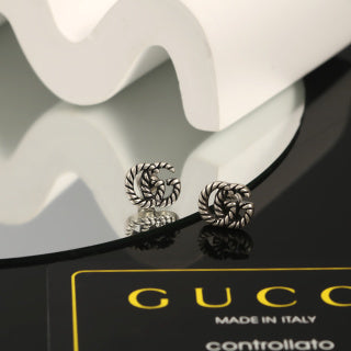 Gucci Twisted Spiral Logo Stud Earrings