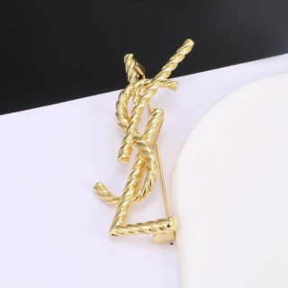 YSL Twisted Rope Monogram Gold Brooch